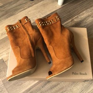 Suede booties by Gracia Maria Palm Beach boutique designer. Gold spikes